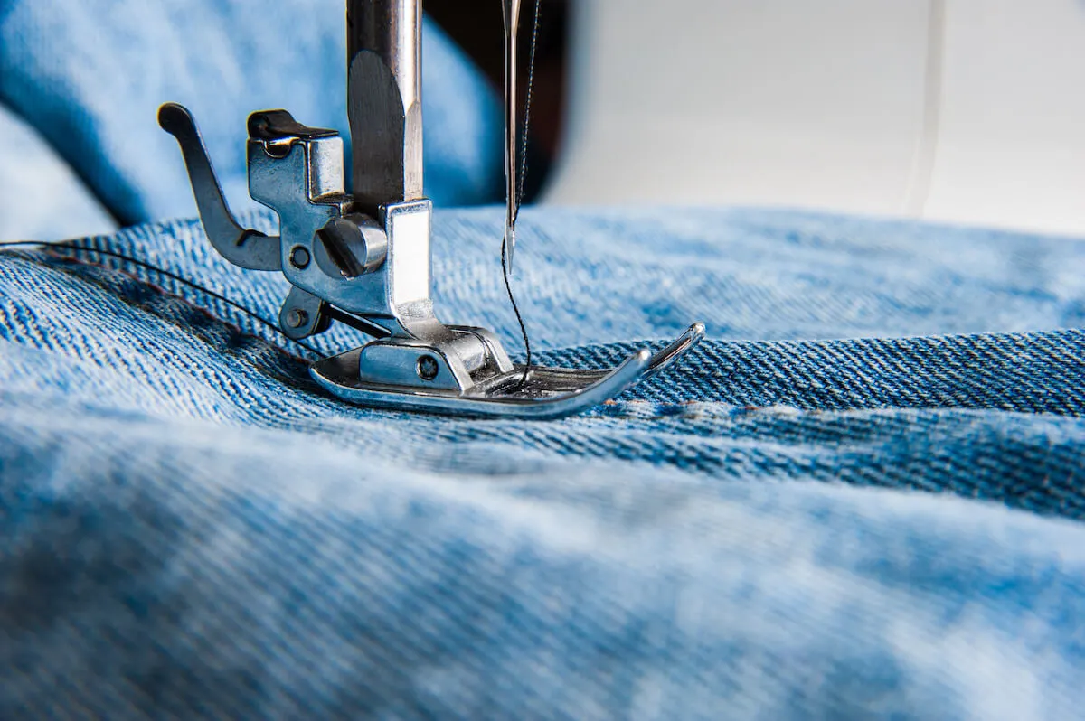 Sewing Denim Jeans with Sewing Machine. Repair Jeans by Sewing Machine  Stock Photo - Image of clothes, equipment: 136595986