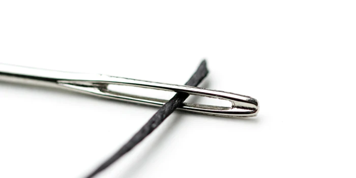 Threading a leather needle 